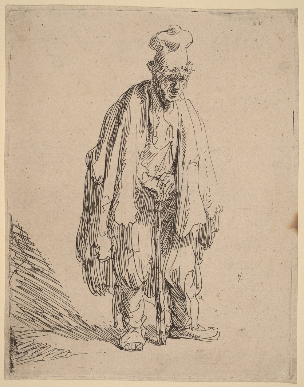 Bedelaar met een hoge pet, staand en leunend op een stok door Rembrandt van Rijn