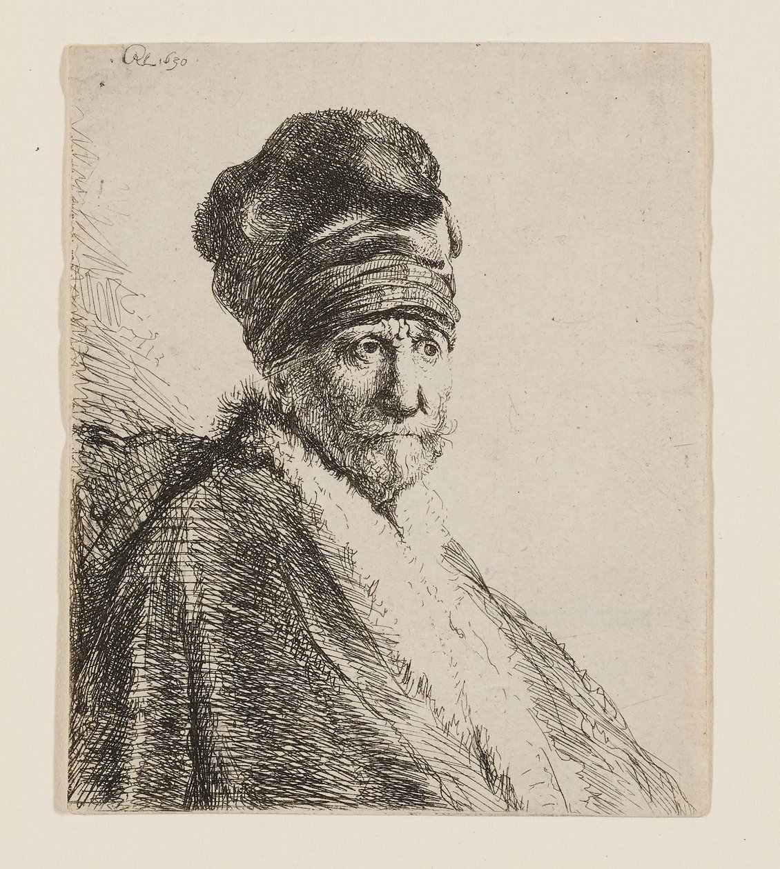 Buste van een man met een hoge pet door Rembrandt van Rijn