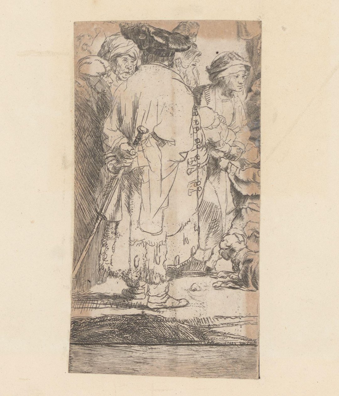 Man in mantel, op de rug gezien door Rembrandt van Rijn