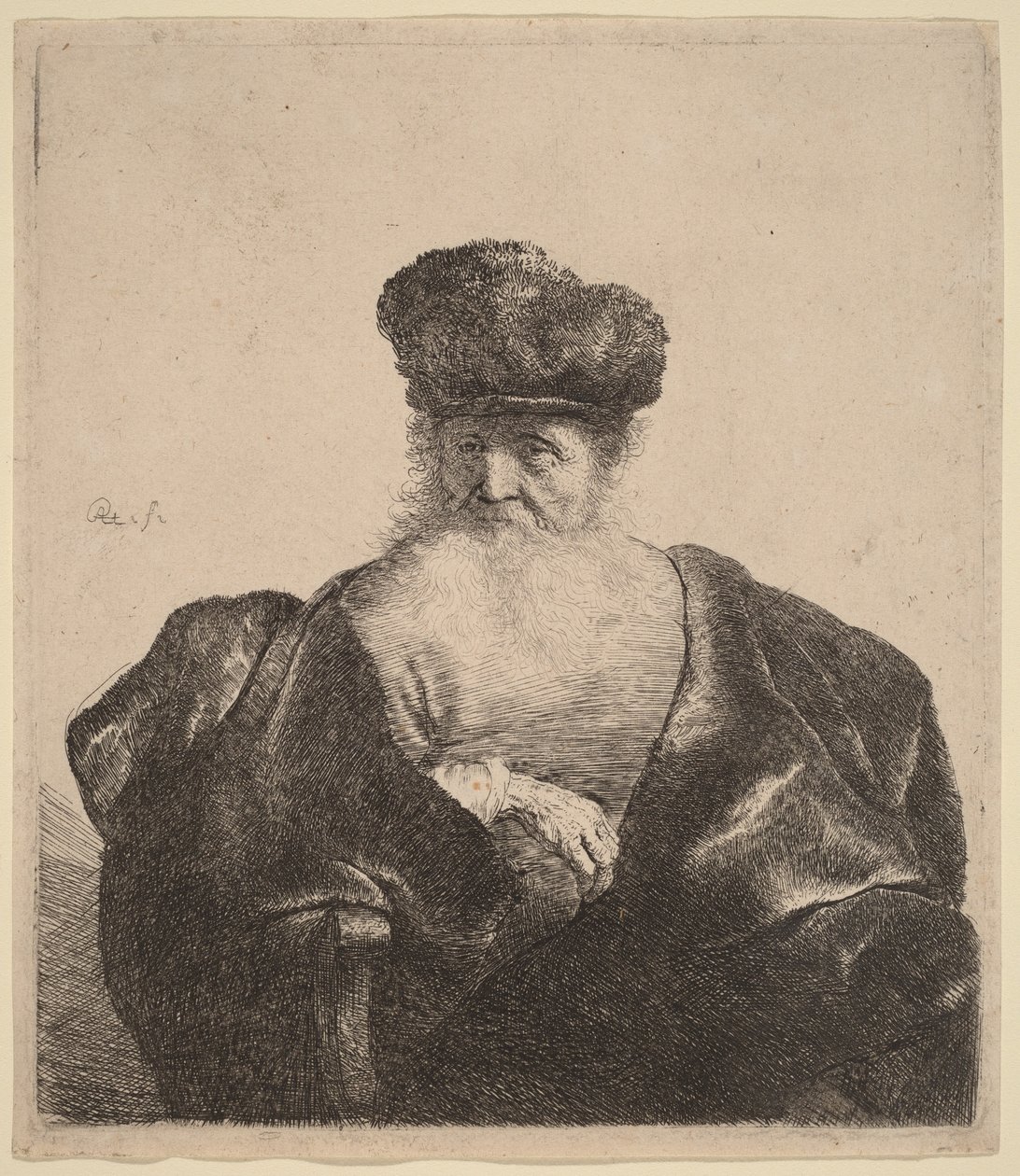 Oude man met baard, bontmuts en fluwelen mantel door Rembrandt van Rijn