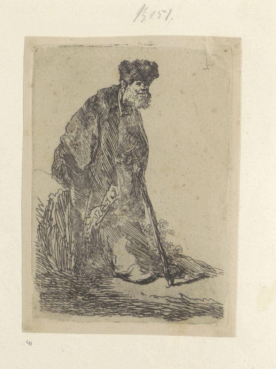 Staande man met een lange mantel en bontmuts door Rembrandt van Rijn