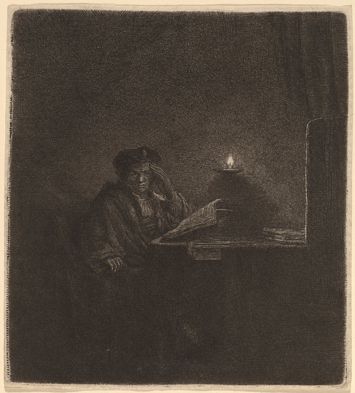 Student aan een tafel bij kaarslicht door Rembrandt van Rijn