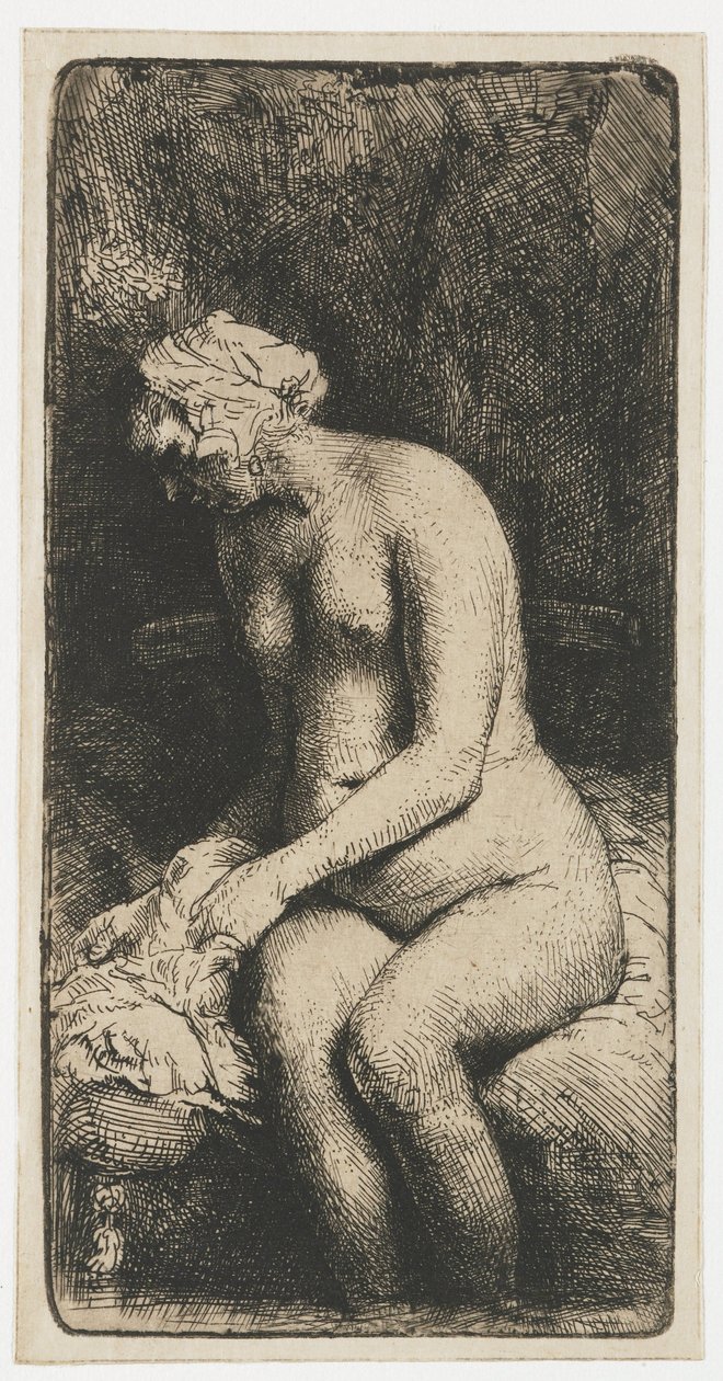 Vrouw die haar voeten baadt in een beek door Rembrandt van Rijn