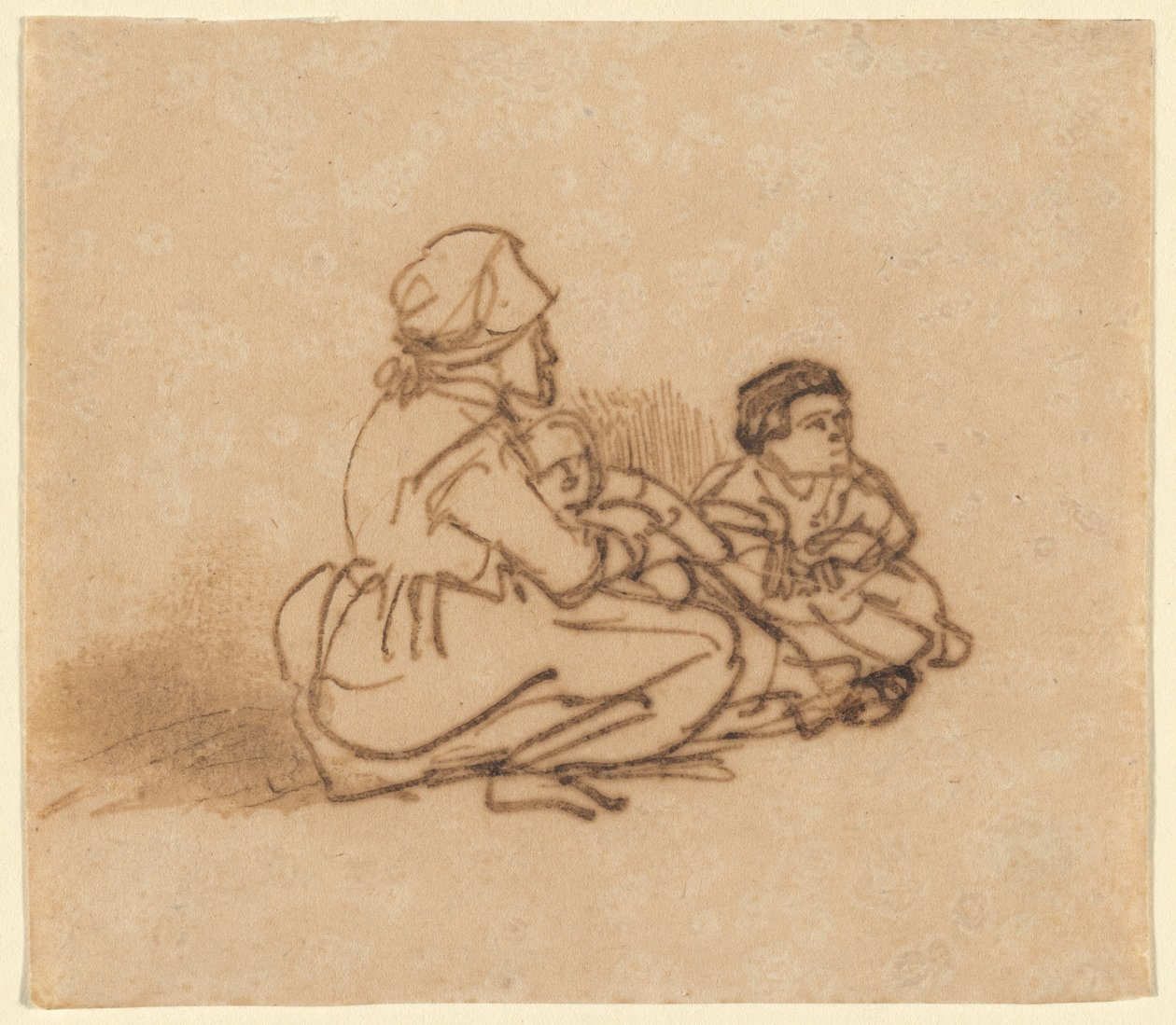 Vrouw zittend op de grond met twee kinderen door Rembrandt van Rijn