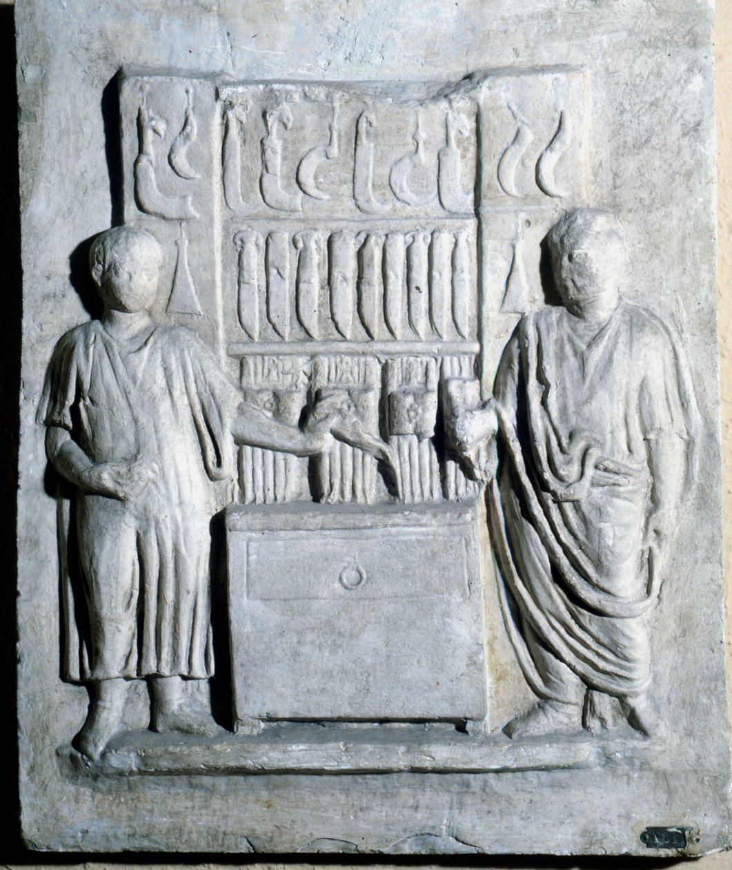 Bord van de messenwinkel in de Romeinse tijd door Roman Roman