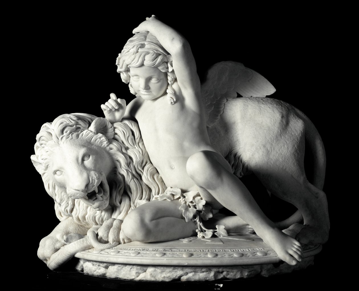 Liefde die de kracht beheerst Marmeren beeldhouwwerk door Santo Varni (1807-1885) 1865. Dim. 85x90x62 cm Uit de collectie van Prins Odon di Savoia. Genua, Galleria d