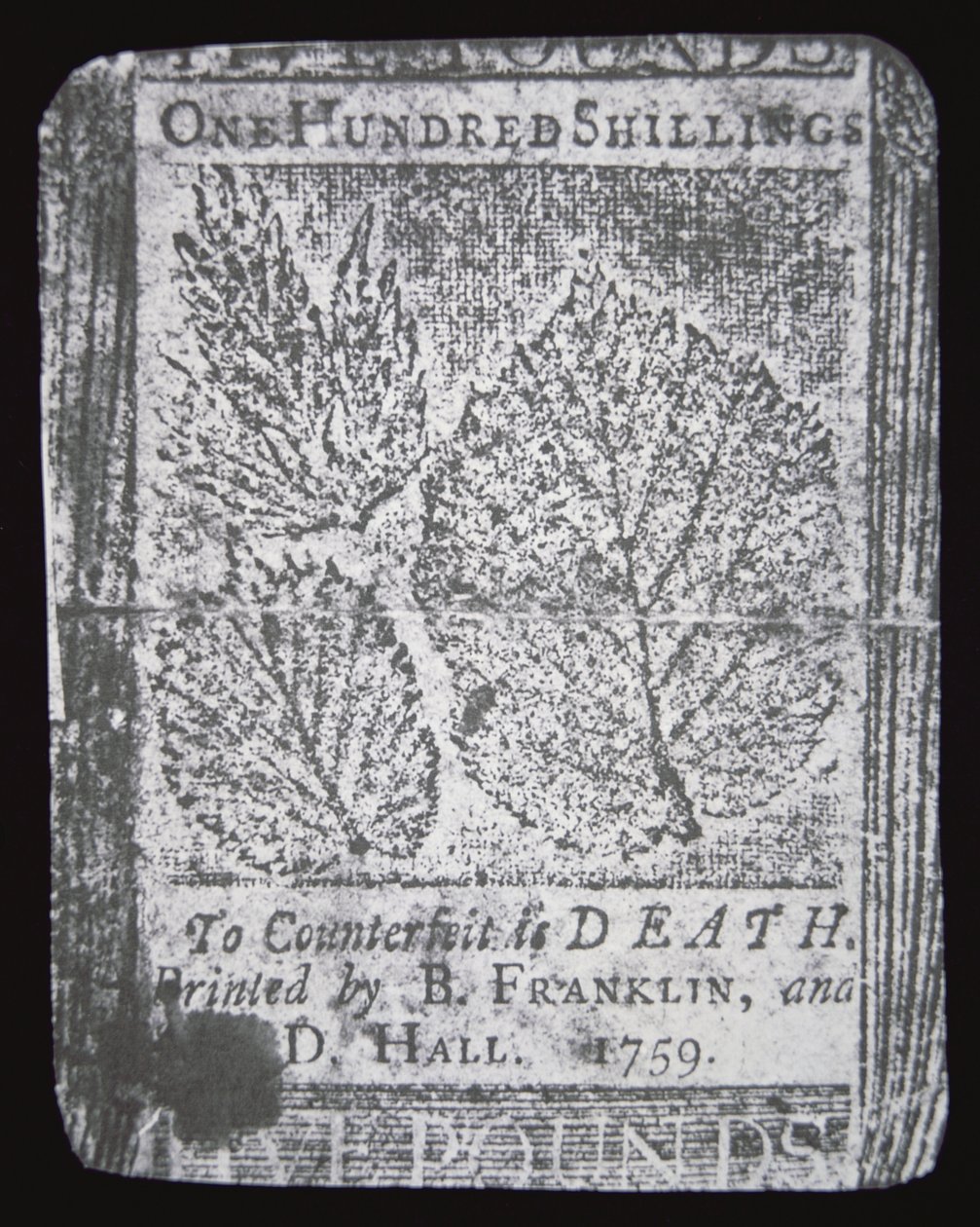 Een 100 shilling biljet ontworpen en gedrukt door Benjamin Franklin in 1759 door School American