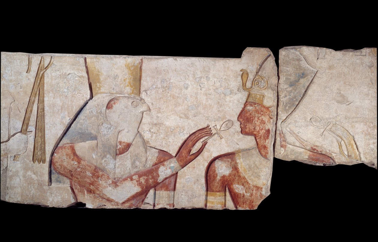 Oude Egyptische kunst: Koning Ramses II wordt voorgesteld aan de goden Horus, Amon en Hathor die hem leven en koninklijke insignes geven. Laag reliëf in kalksteen uit de tempel van Ramses II in Abydos, rond 1250 v.Chr. 19e dynastie. Nieuwe Rijk. Parijs, Mu door School Egyptian