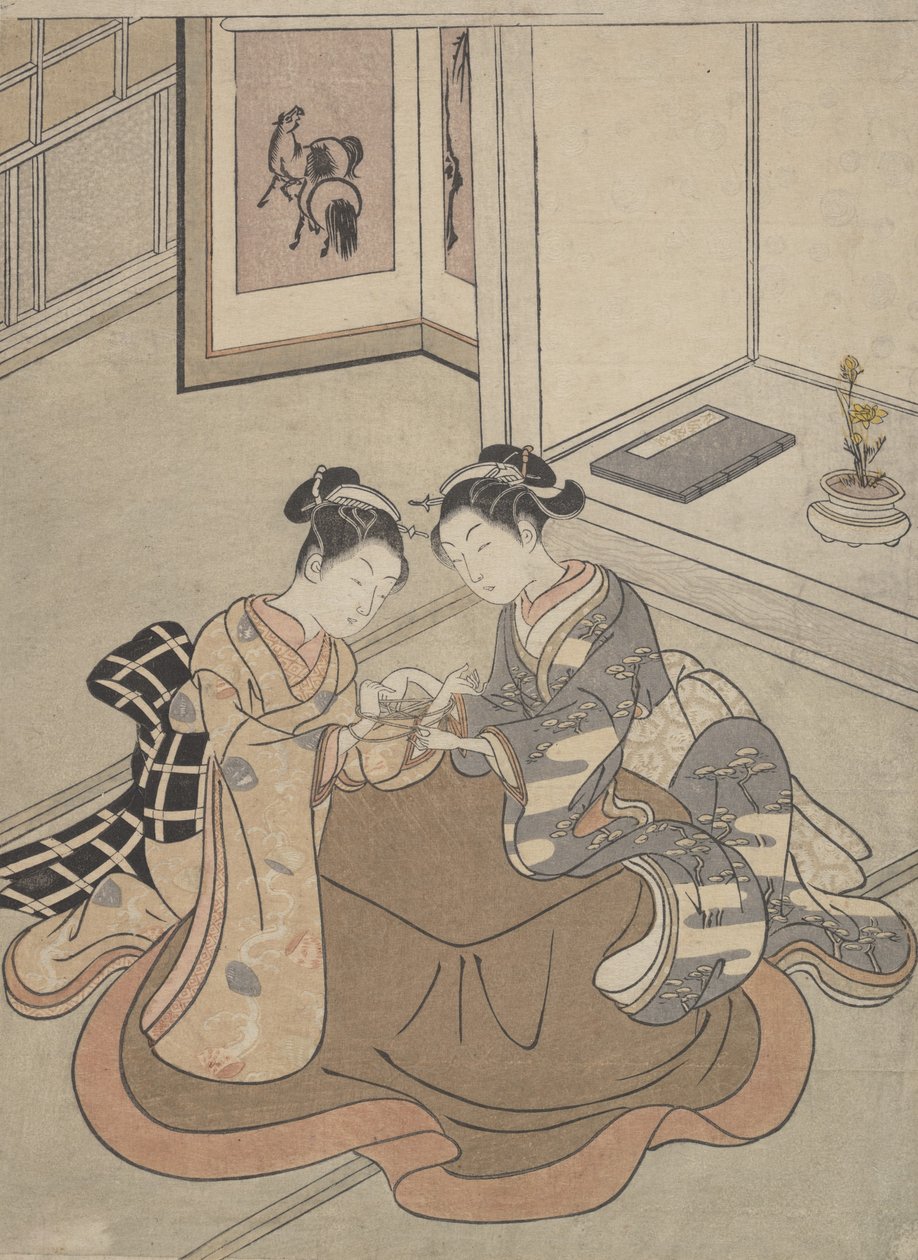 Twee jonge vrouwen zittend bij een kotatsu die kat-en-muis spelen, ca. 1765 door Suzuki Harunobu