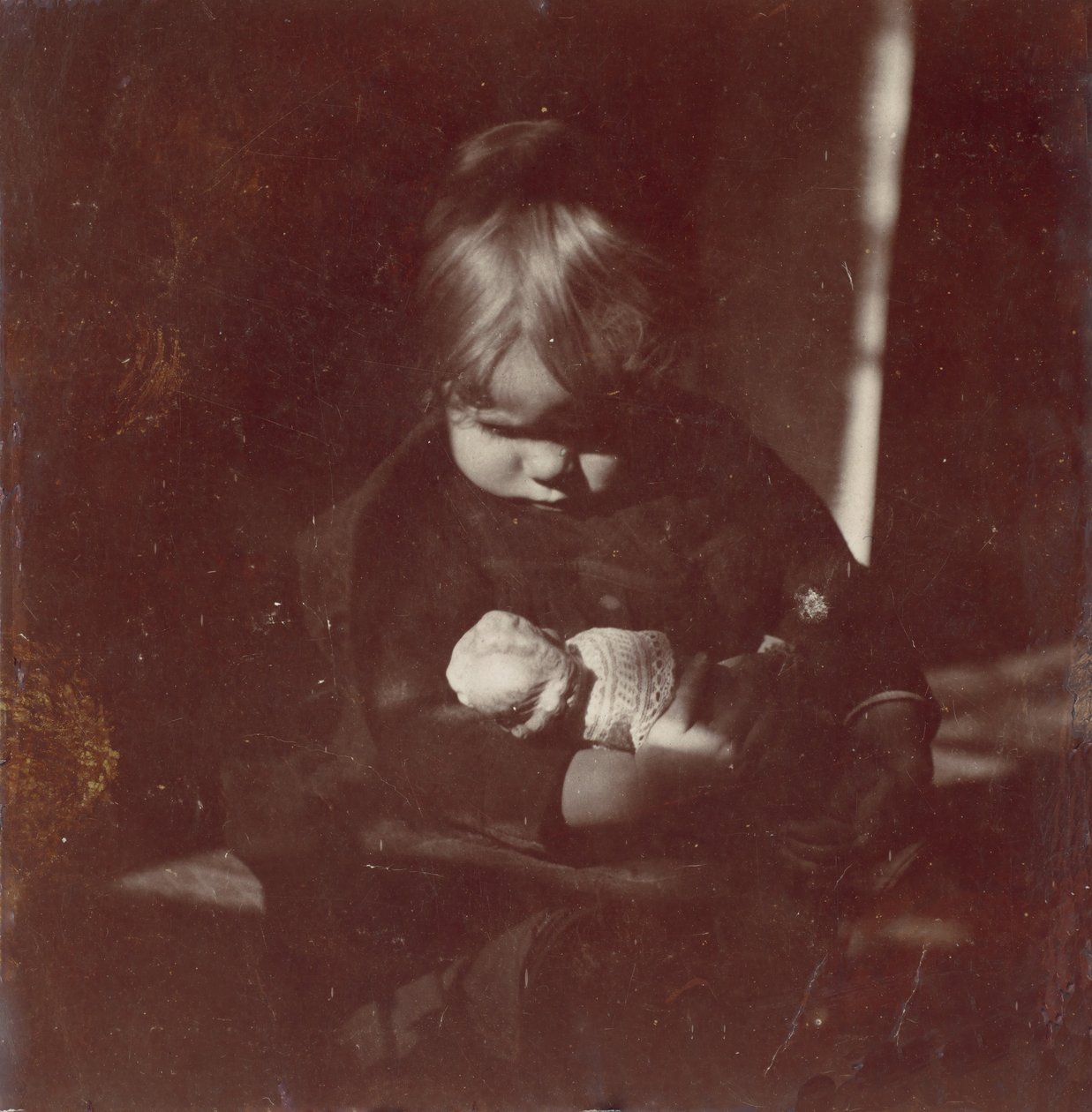 Betty Reynolds met Pop op Schoot, ca. 1885 door Thomas Eakins