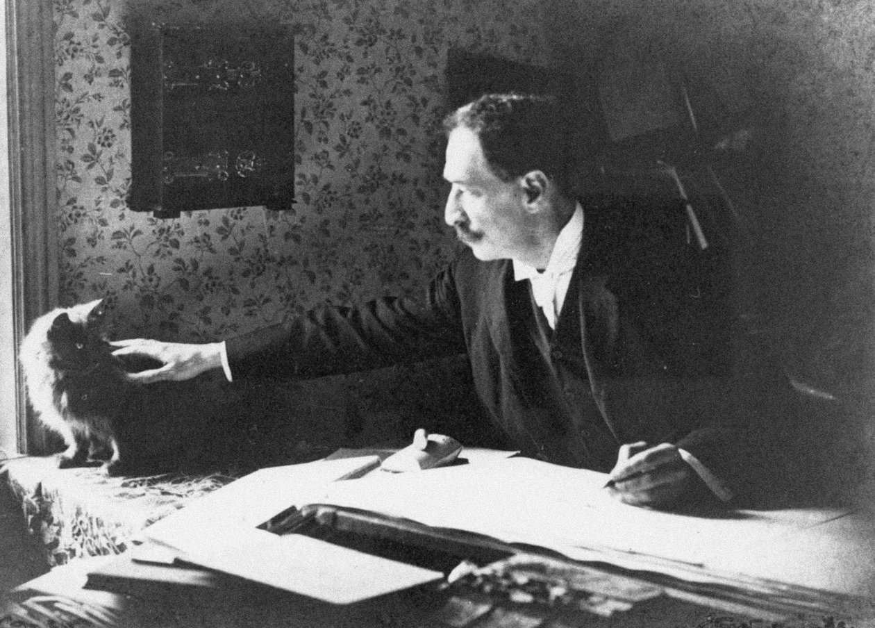 Louis Wain aan zijn tekentafel, 1890s door Unbekannt