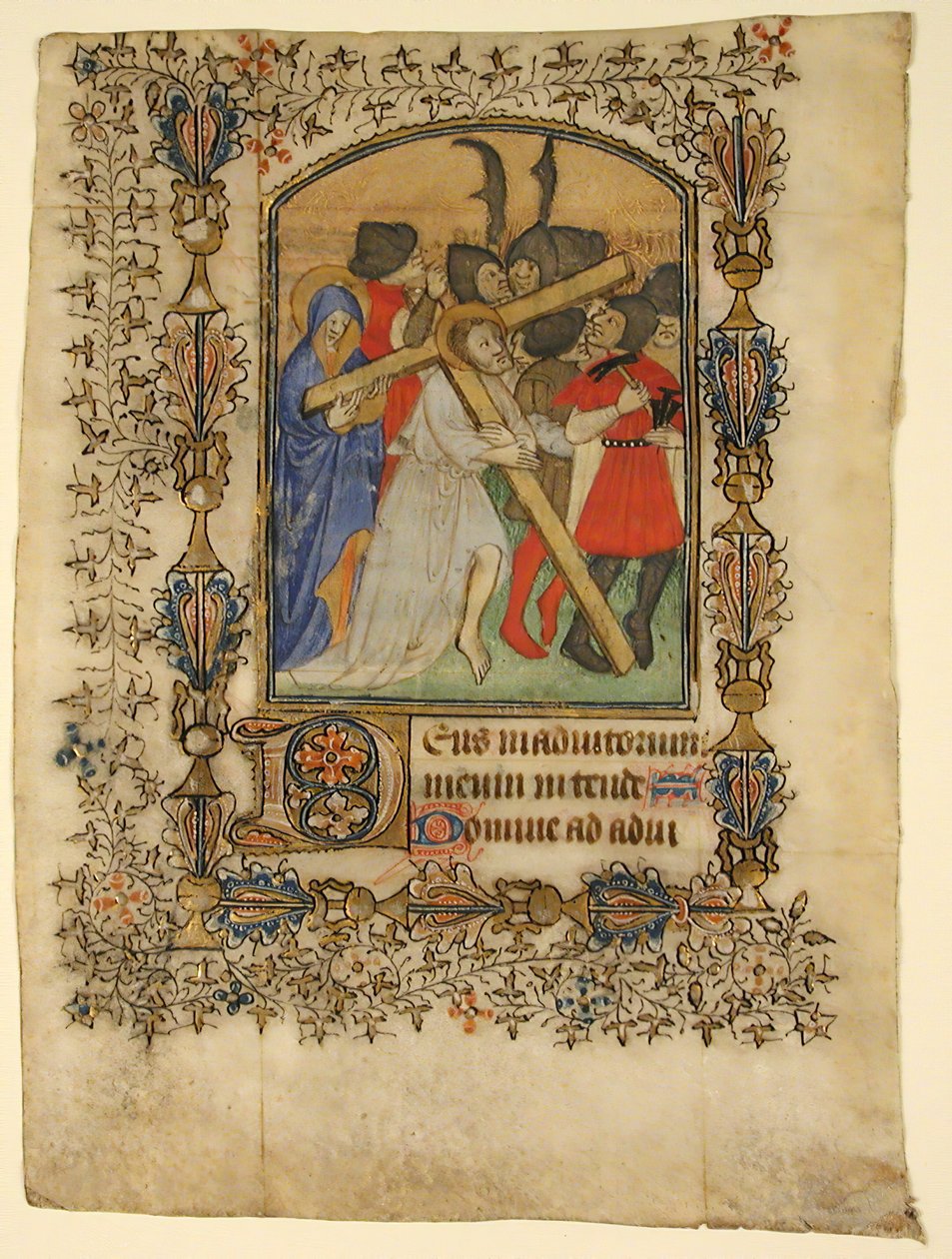 Manuscriptblad uit een Getijdenboek... Verlichte initiaal D en Christus die het kruis draagt, 1390-140 door Unbekannt