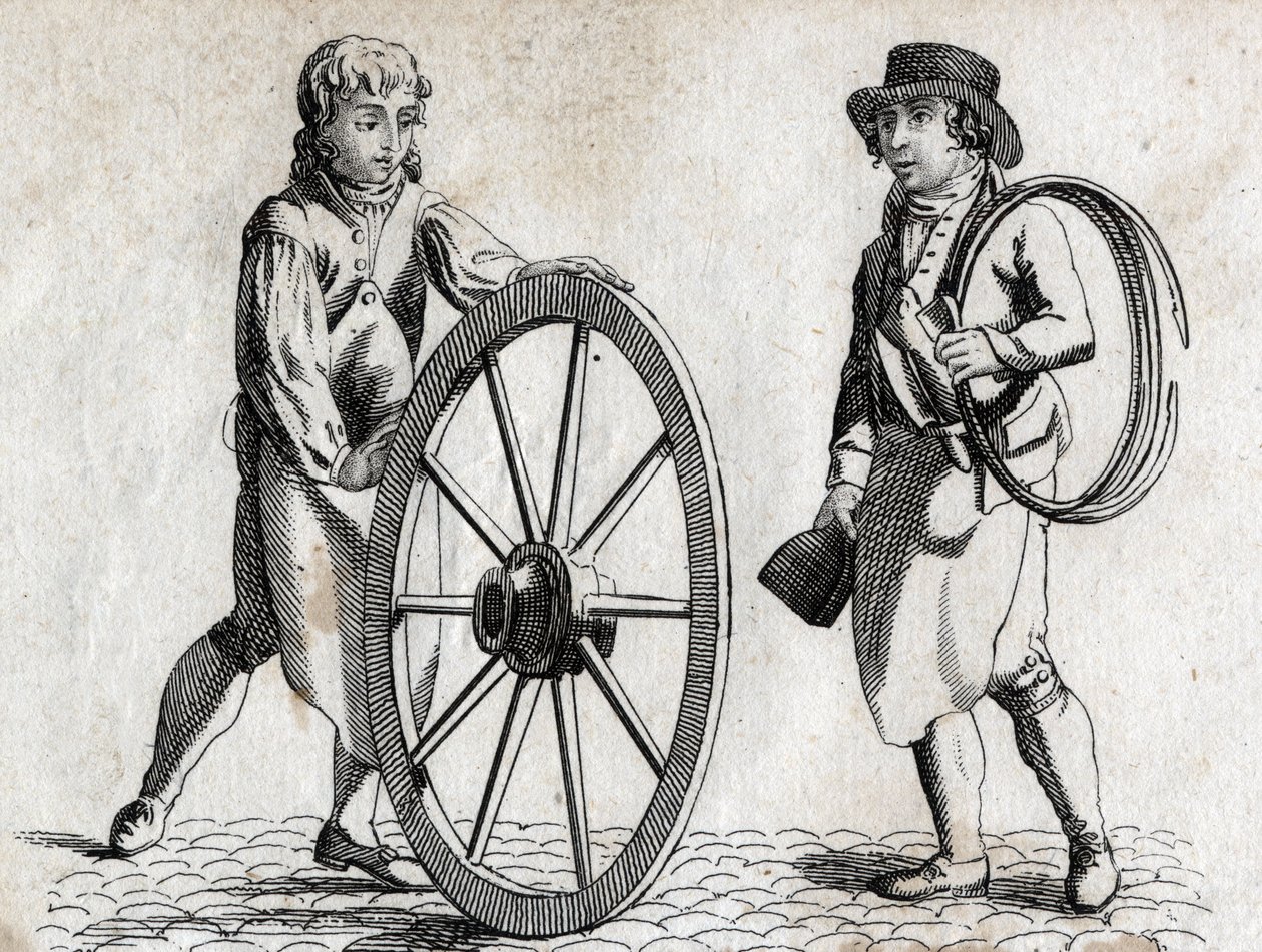 Wagenmaker met wagenwiel en leerling. Gravure eind 18e eeuw. door Unknown artist