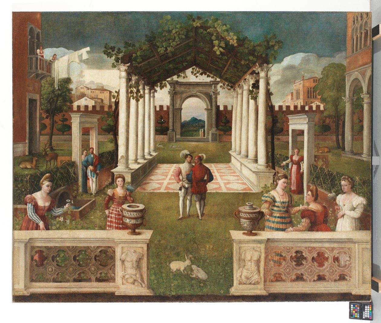 Een klassiek architectonische tuin met elegante figuren, een bergachtig landschap daarachter, c. 1530 door Veronese School