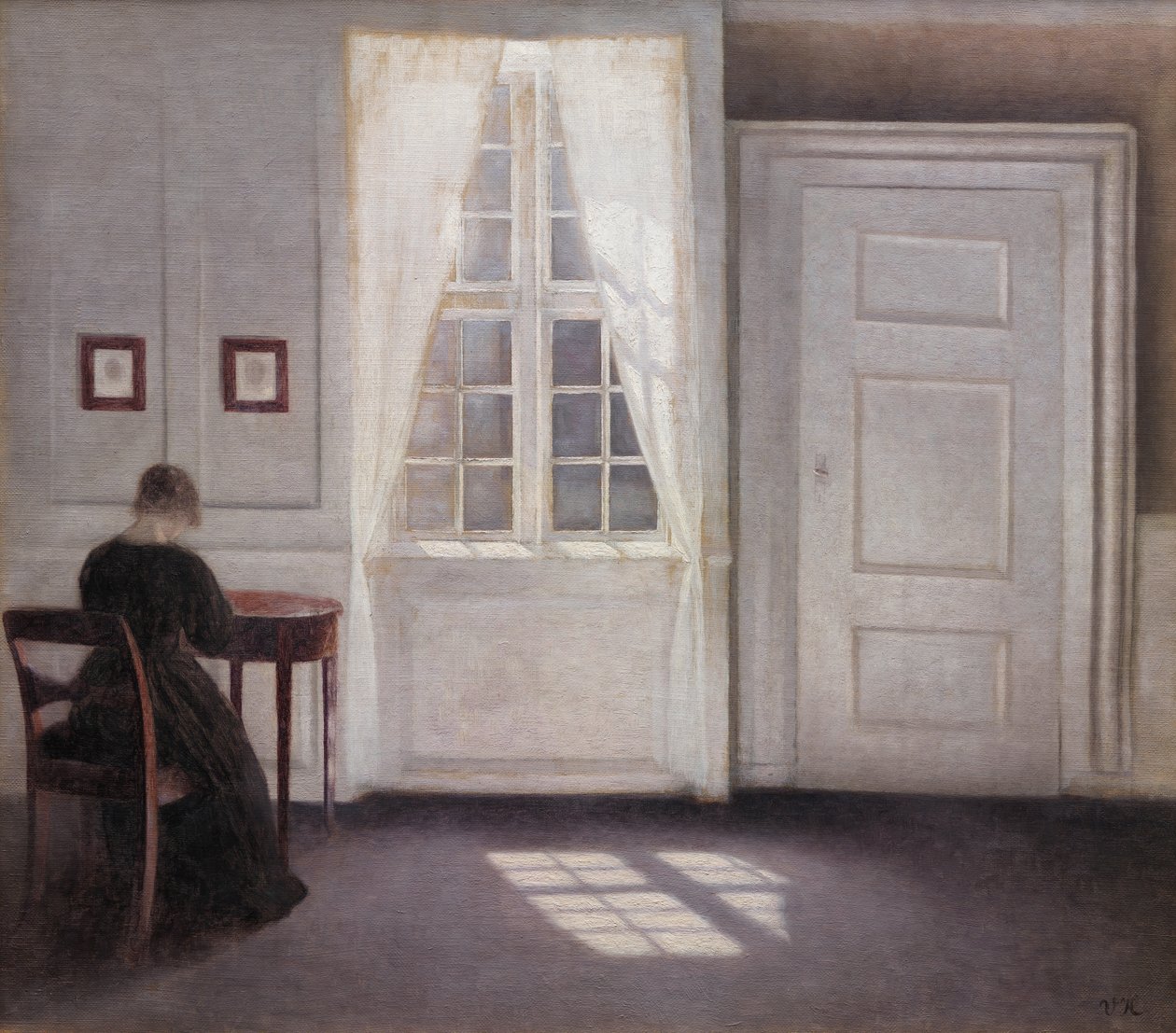 Een kamer in het huis van de kunstenaar in Strandgade, Kopenhagen, met de vrouw van de kunstenaar door Vilhelm Hammershøi