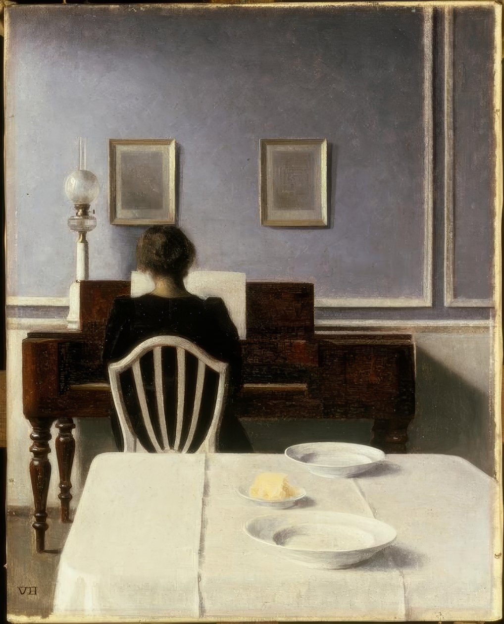 Interieur met jonge vrouw aan de piano door Vilhelm Hammershoi