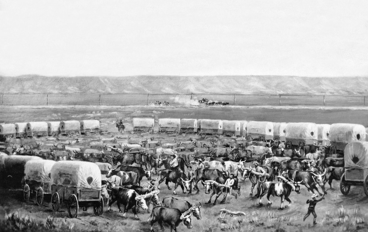 Ossen worden ingespannen in een omheining van huifkarren in een schilderij van W. H. Jackson, Scotts Bluff, Nebraska door William Henry Jackson