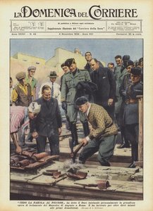 Ik geef het woord aan de pikhouweel, zei de Duce, terwijl hij persoonlijk het grootse werk begon