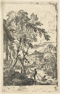 Bergachtig landschap met bomen en man met hond