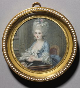 Portret van een vrouw in een blauwe jurk
