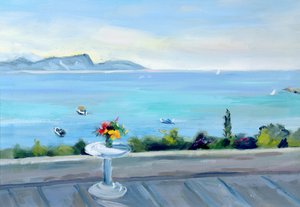 Een terras met uitzicht op zee