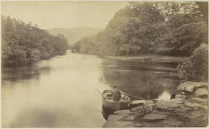 Rivierlandschap in Engeland, met op de voorgrond een man in roeiboot