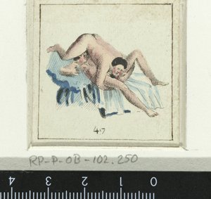 Vrijend paar, man ligt omgedraaid op vrouw