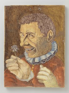 Plaat van faience met man met bloem