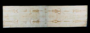 De heilige lijkwade van Turijn (of lijkwade of sacra sindone), linnen doek met sporen (verondersteld die van Christus) van marteling van een lichaam. Koninklijke Kapel van de Kathedraal Sint-Jan de Doper van Turijn, Italië.