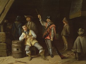 Een soldaat die een musket schoonmaakt