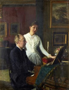 Acteur Peter Jerndorff en zijn vrouw Amalie aan de piano