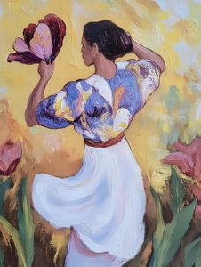 Vrouw in een bloementuin