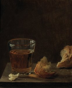 Een glas bier en een broodje op een tafel