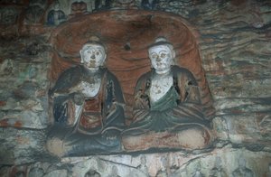 China, provincie Shanxi, zandstenen beelden van Boeddha in de Yungang-grotten
