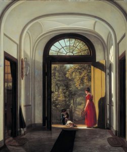 De vrouw en de zoon van de kunstenaar in de vestibule van hun huis