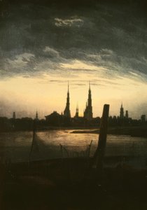 Stad bij maanopkomst