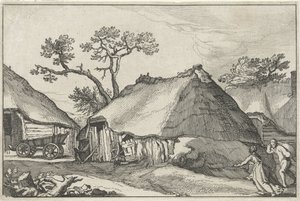 Boerderij en een wagen op een erf