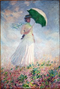 Vrouw met een parasol naar rechts gedraaid