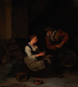 Een ridder en een vrouw aan het spinnewiel