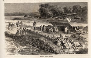 Een houten vlot op de Donau, voor het transport van goederen en mensen door Dieudonne Auguste Lancelot