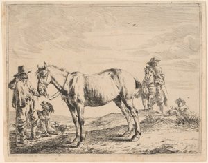Een man die een paard bij zijn teugel houdt