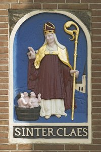 Kerstman plaquette in de Dam door Dutch School