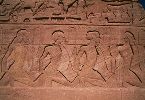 Gevangenen van het Noorden, bas-reliëf aan de voet van de reuzen van de Grote Tempel van Ramses II, Abu Simbel (UNESCO Werelderfgoedlijst)