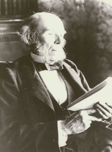 Herbert Spencer, portret, lezend