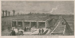 Aanleg van de betonnen dijk over de Plaistow moerassen door English School