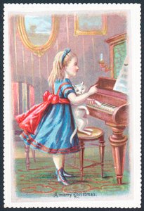 Meisje met kat bij piano