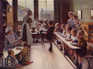 Jonge kinderen tijdens de maaltijd in een kinderdagverblijf