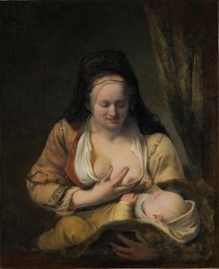 Vrouw die een baby voedt