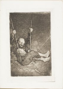 Oude man op een schommel