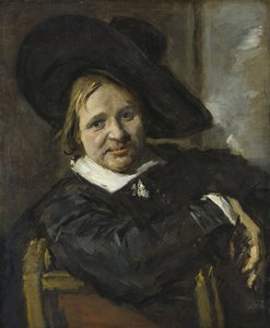 Portret van een zittende man met een zachte hoed
